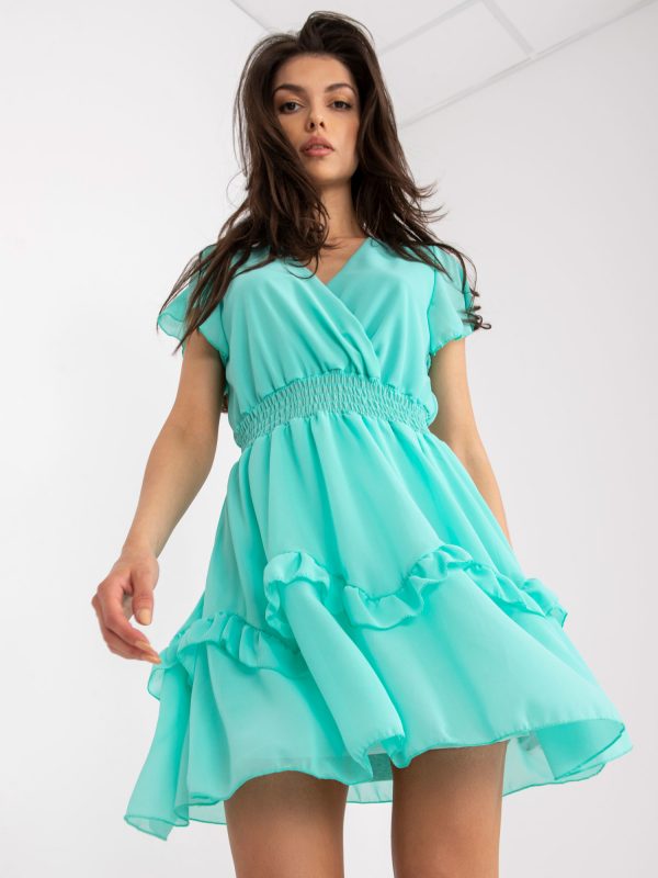 Mint mini dress with flounce and lining