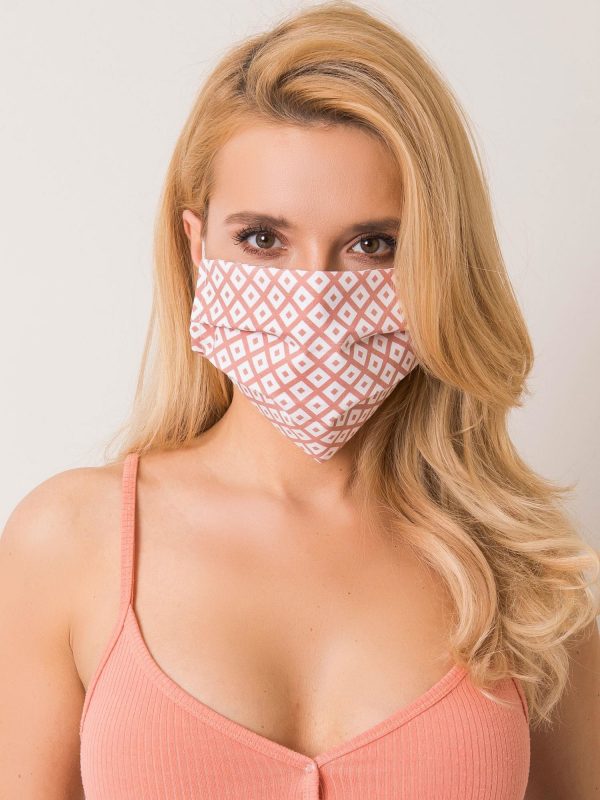 Dirty pink protective mask in geometric patterns