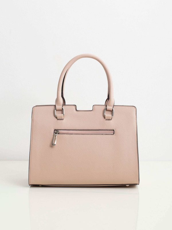 Light pink handbag with detachable strap