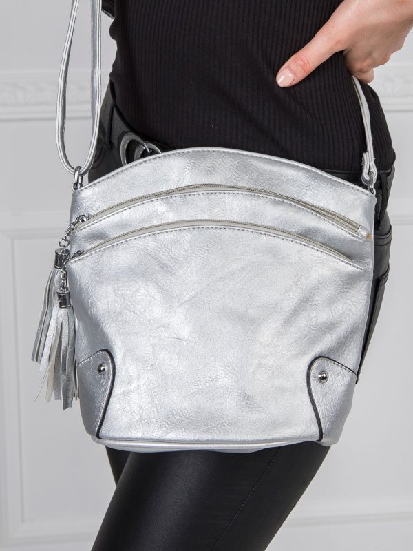 Silver handbag with zippers