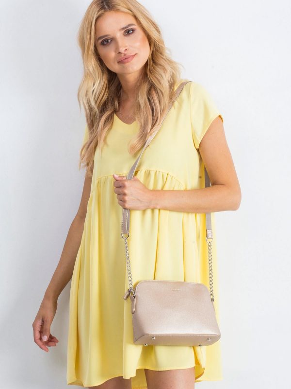 Women's gold handbag made of eco leather