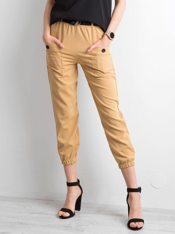 Light brown trousers with welts