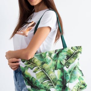 Green bag in leaves