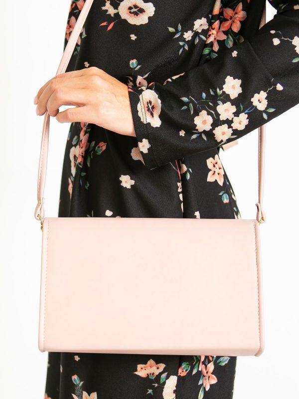 Dirty pink clutch bag