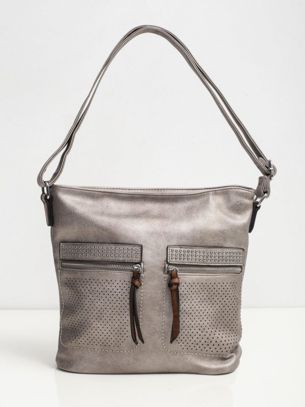 Silver bag with openwork pockets