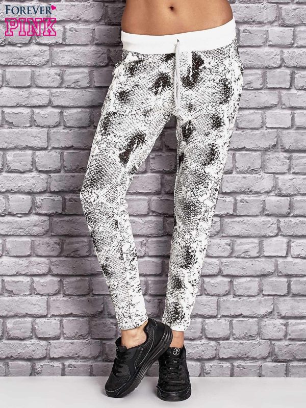 Wholesale Sweatpants with glitter applique and ecru print