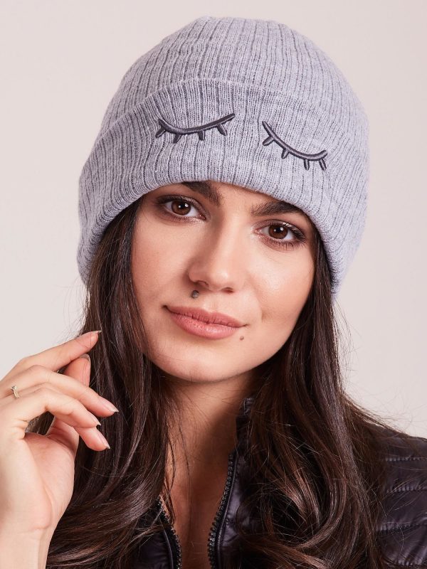 Wholesale Grey light cap with eyelashes