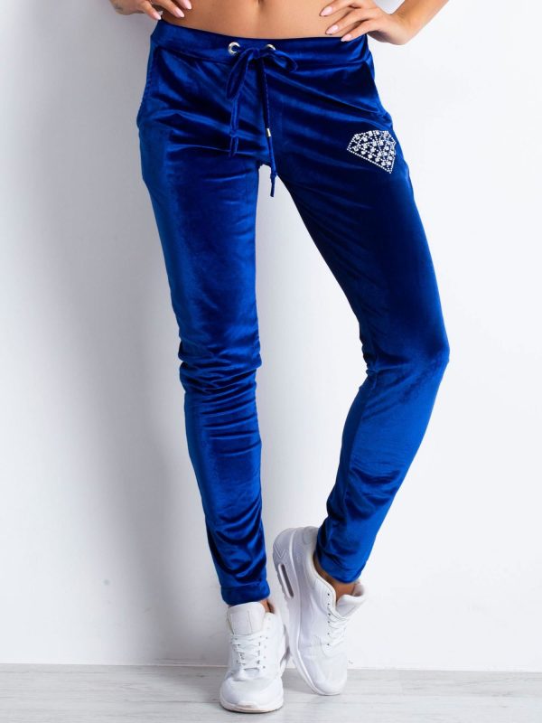 Wholesale Blue sweatpants in soft velour with diamonds