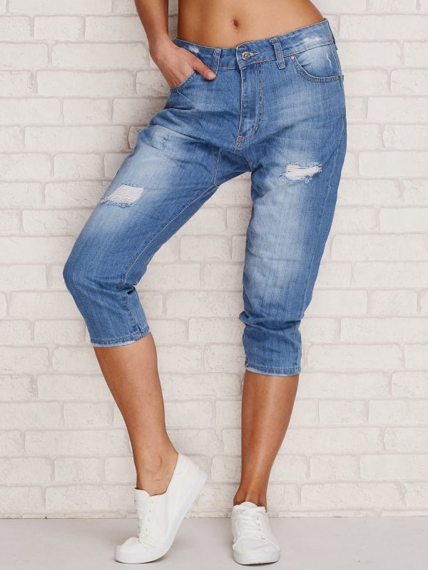 Wholesale Capri denim pants with abrasions blue