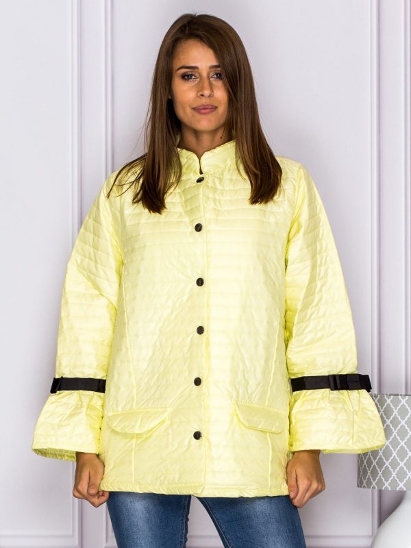 Wholesale Quilted transitional jacket with bows on sleeves yellow