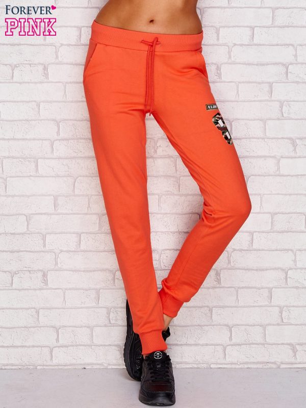 Wholesale Coral sweatpants with stripes