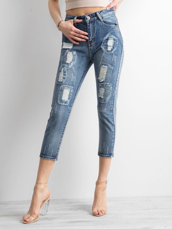 Wholesale Blue jeans with abrasions and wash effect