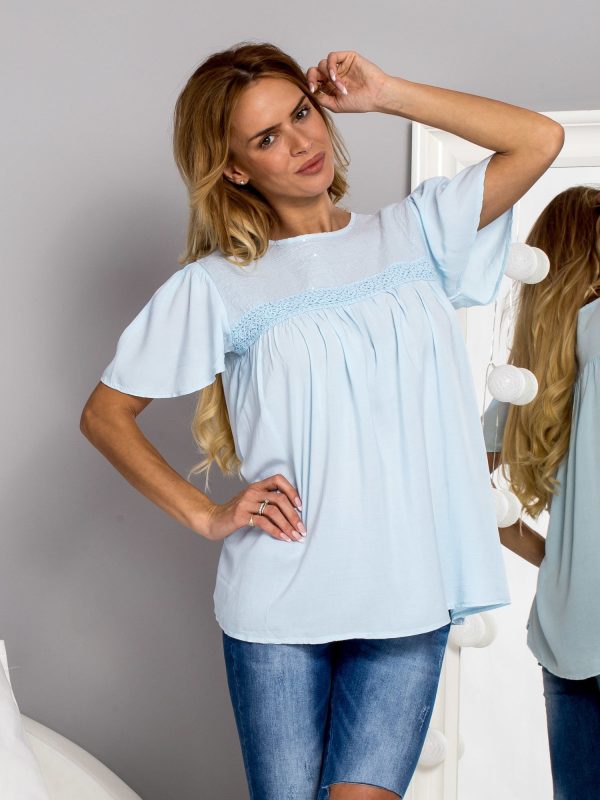 Wholesale Fairy blouse with sequin neckline light blue