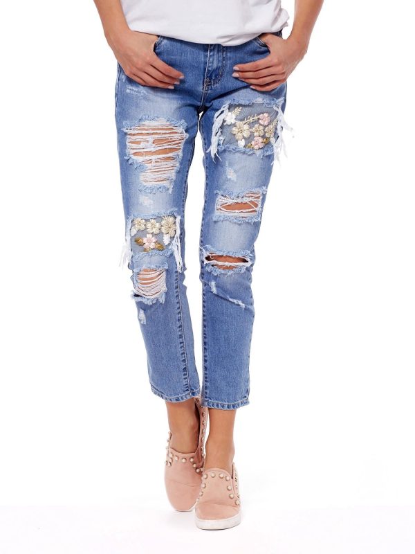 Wholesale Blue jeans with holes and floral embroidery