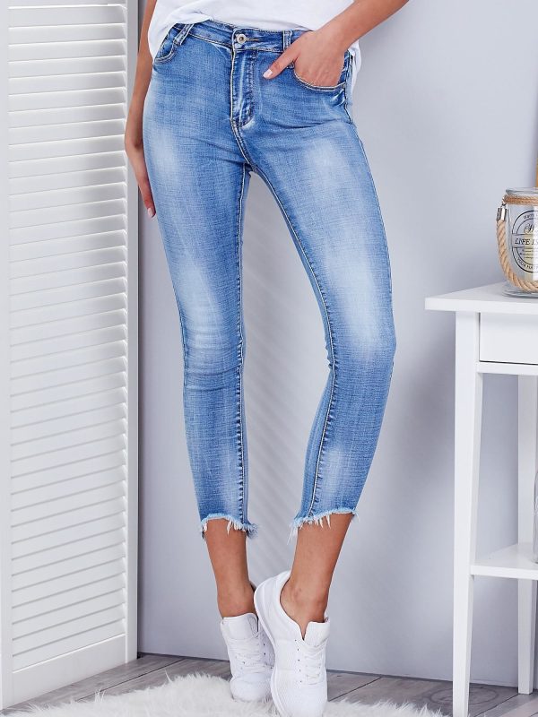 Wholesale Blue denim pants with frayed legs