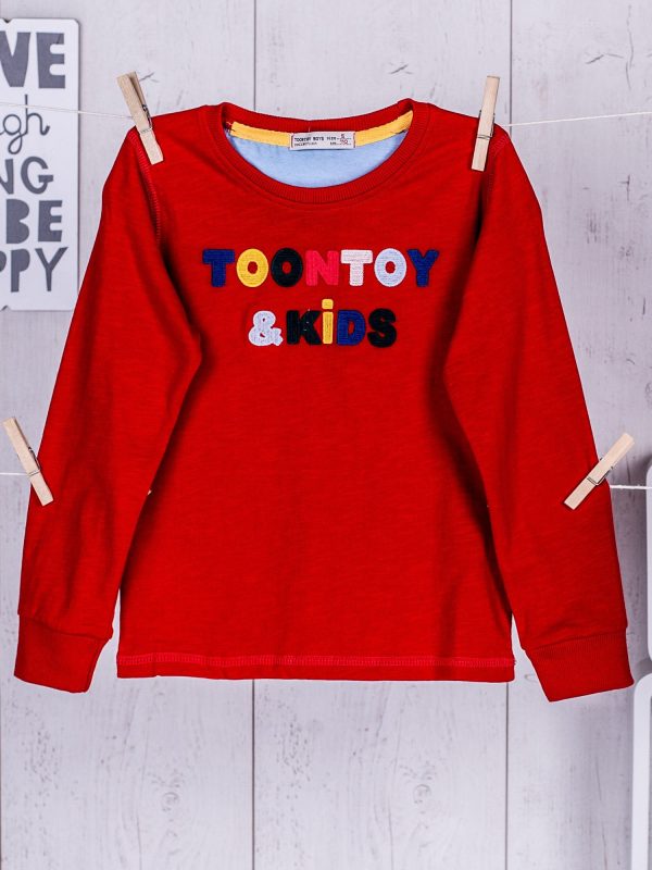 Wholesale Red blouse for a boy with an engraved inscription