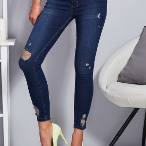 Wholesale Blue jeans with rips on the legs