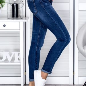 Wholesale Denim fitted trousers with abrasions blue