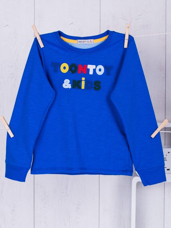 Wholesale Blue blouse for a boy with an engraved inscription