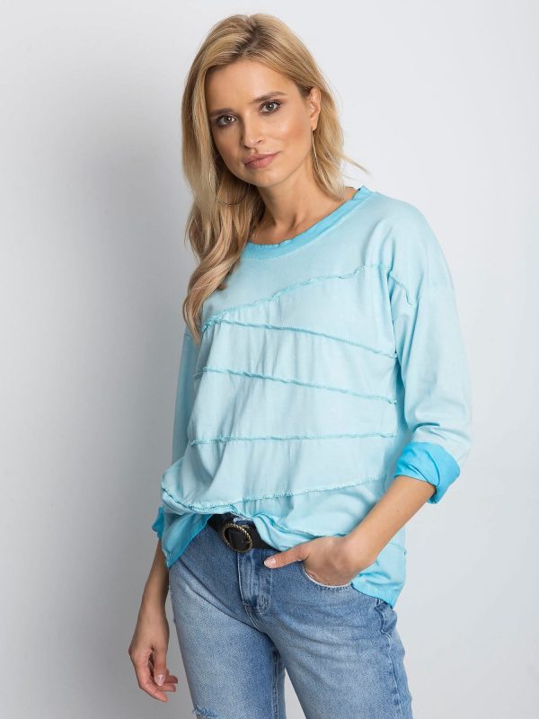 Wholesale Blue blouse with asymmetrical stitching