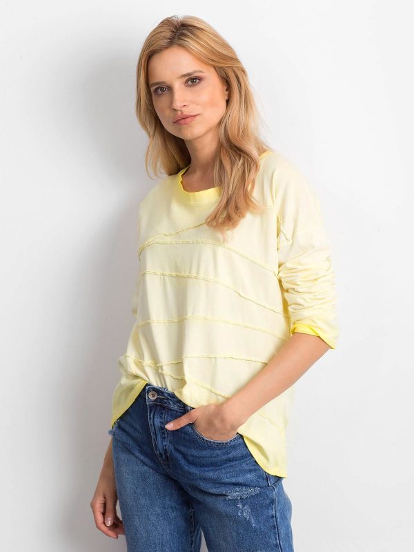 Wholesale Yellow blouse with asymmetrical stitching