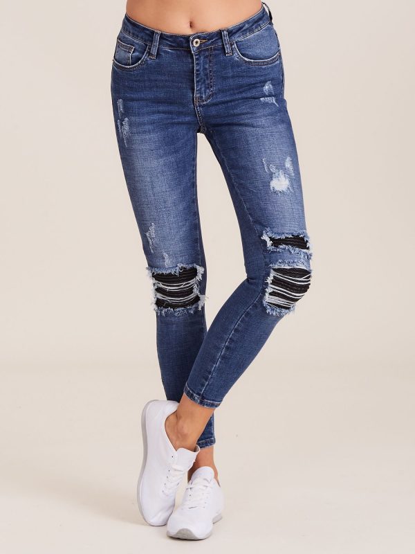 Wholesale Blue denim pants with zippers and holes