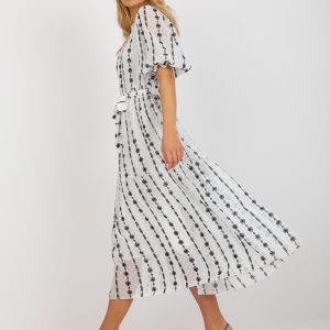 Wholesale White and black midi dress with flounce and floral embroidery